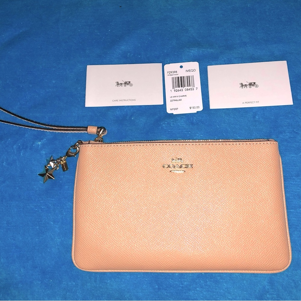 Authentic LARGE WRISTLET WITH CHARMS (COACH F29398) $150